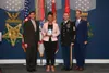 Retired Sgt. Maj. Tamika L. Wynn poses with Secretary of the Army Mark T. Esper, Sgt. Maj. of the Army Daniel A. Dailey, and SHARP Director Dr. James A. Helis during the Sexual Assault Awaren