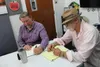 Michael Carson (right) works on Mat-Su Opioid Task Force plans with John Green at MyHouse Mat-Su Homeless Youth Center in downtown Wasilla. Frontiersman file photo.