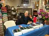 Julie LeMay signs copies of her book, “The Echo of Ice Letting Go.” Courtesy photos
