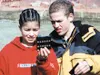 Teeland Middle School students examine pH levels of water while
working on a project to put settling ponds in at Wasilla's
Iditapark. That program was one of several run with ACWA grant
fundi