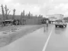 Photo courtesy Alaska State Troopers A semi lies on its side
along the Parks Highway near Willow-Fishook Road after it crashed
into a two-door Honda Sunday afternoon.