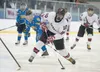Houston senior defenseman Tim Bakletskiy takes a shot on goal during the Hawks’ game against the Monroe Catholic Rams Saturday in the ASAA/First National Cup state hockey 3A chamionship game 