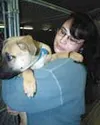 Robin Daniels is a shelter assistant at the Mat-Su Animal Care
and Regulation Shelter. She says she basically gets to do regular
office work, but with a couple hour break each day feeding,
cl