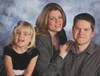 Angela, Joe and Becca Hubbard posed for this family photo on Oct. 8, about a month before a Nov. 7 carbon monoxide leak at their Wasilla home killed Angela and hospitalized Joe and their daug