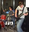 Kacey Tompkins drums while cousin William Tompkins provides the
bass during a practice session. Photo by CASEY
RESSLER/Frontiersman.