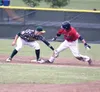 Mat-Su Miners infielder Tyler Wolfe tags a Chugiak runner out at second during a 5-4 win over the Chinooks June 9 at Loretta French Field. JEREMIAH BARTZ/Frontiersman