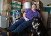 Sadie, registered service dog of Terry Ash (pictured), passed away about a week after this photo was taken, while Ash was packing up her apartment on Oct. 14. Ash was given a notice to quit f