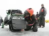 (ROBERT DeBERRY/Frontiersman) Todd Palin tightens his ice studs before the start of the 2010 Iron Dog Snowmachine Race on Big Lake. Palin and team mate Scott Davis scratched from the 2010 rac