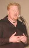 RUSSELL STIGALL/Frontiersman Sheron Patrick of Palmer used his
solid tenor voice to win the second annual Mat-Su Miners “Valley
Idol” open mic contest held at the Great Bear Brewing Company o