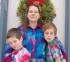 Courtesy photo/Cameron Edwards Friends and neighbors are making
efforts to help Jennifer Woods, center, and her 12-year-old son
Vincent, right, following a fire that destroyed their home and
