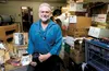 The Food Pantry of Wasilla Executive Director Eddie Ezelle stands inside the storeroom at the pantry’s Wasilla location. The pantry received $16,050 in donations through the 2013 Pick. Click.