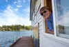 Coffee Port Espresso owner Billi Perkins runs her floating coffee hut on Big Lake on the weekends throughout the summer. The central location allows boaters to pull right up and order cold or