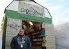 David Fuller stands in front of the Cobb Street Market vendor booth at the Alaska State Fair. Jacob Mann/Frontiersman