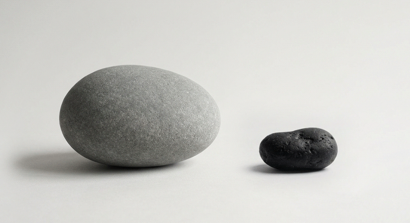 Visual contrast expressing the key message that the 'shape' of a thyroid nodule is more important than its 'size.'