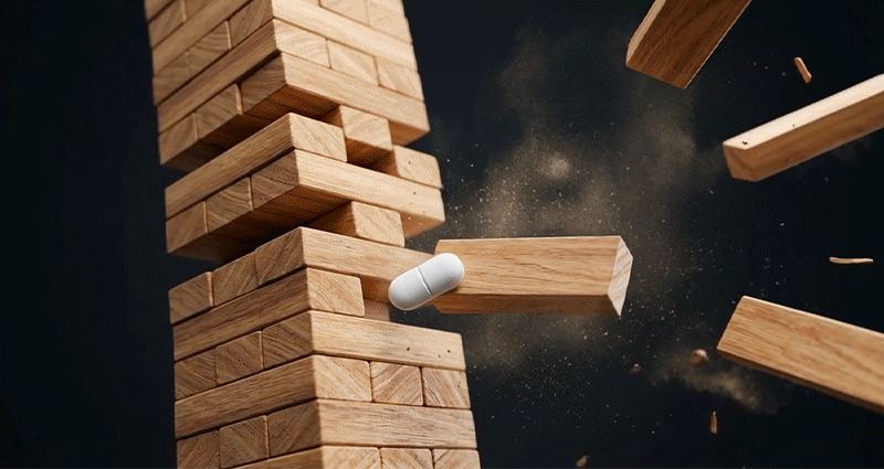 Collapsing Jenga tower from a missing block, representing hormonal imbalance.