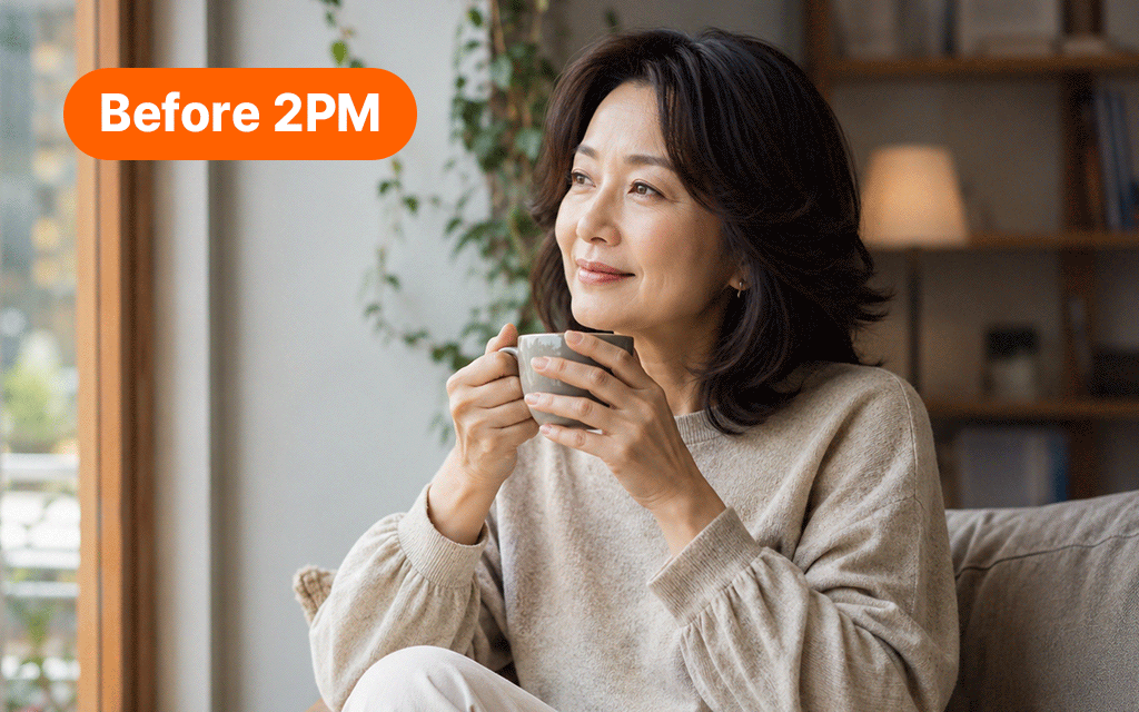 A middle-aged woman enjoying a cup of coffee at a cafe or in her living room