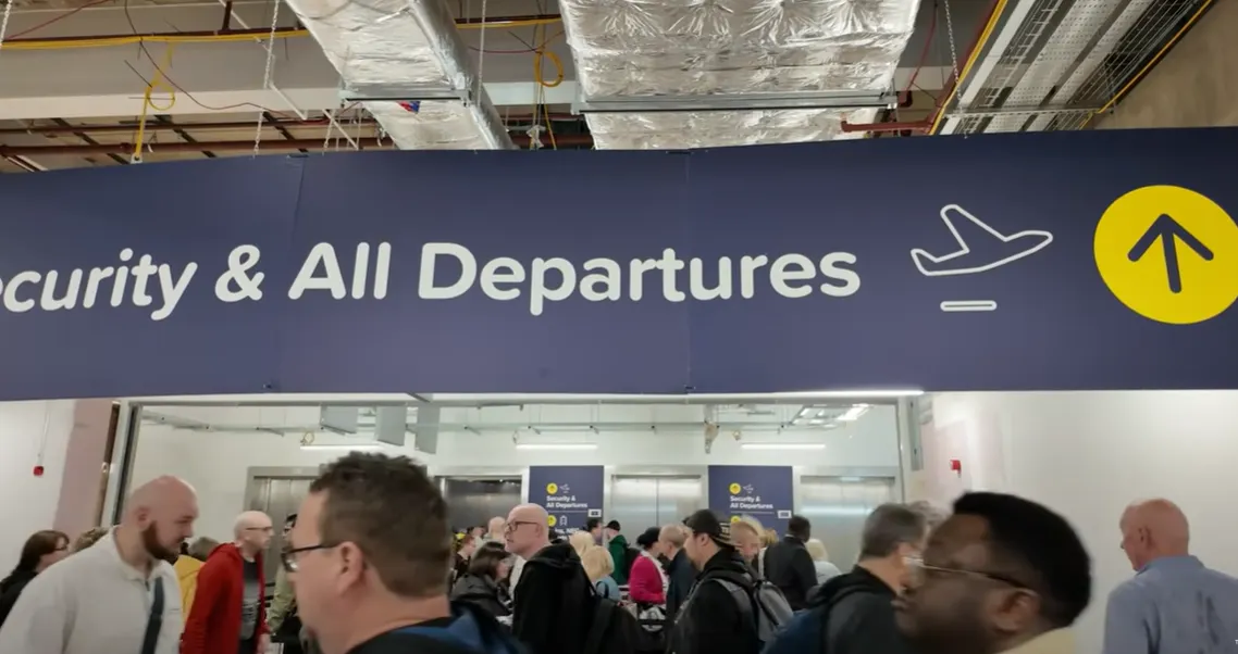 Airport anguish as holiday makers forced to queue for hours
