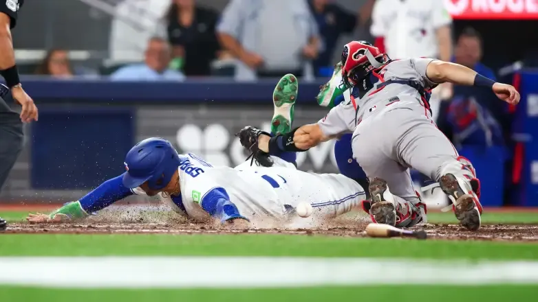 Blue Jays overcome rare call to beat Red Sox 2-1