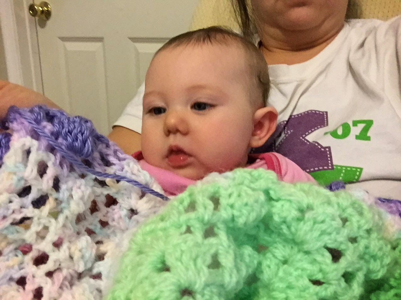 Bean is helping me make her cousin A's blanket.