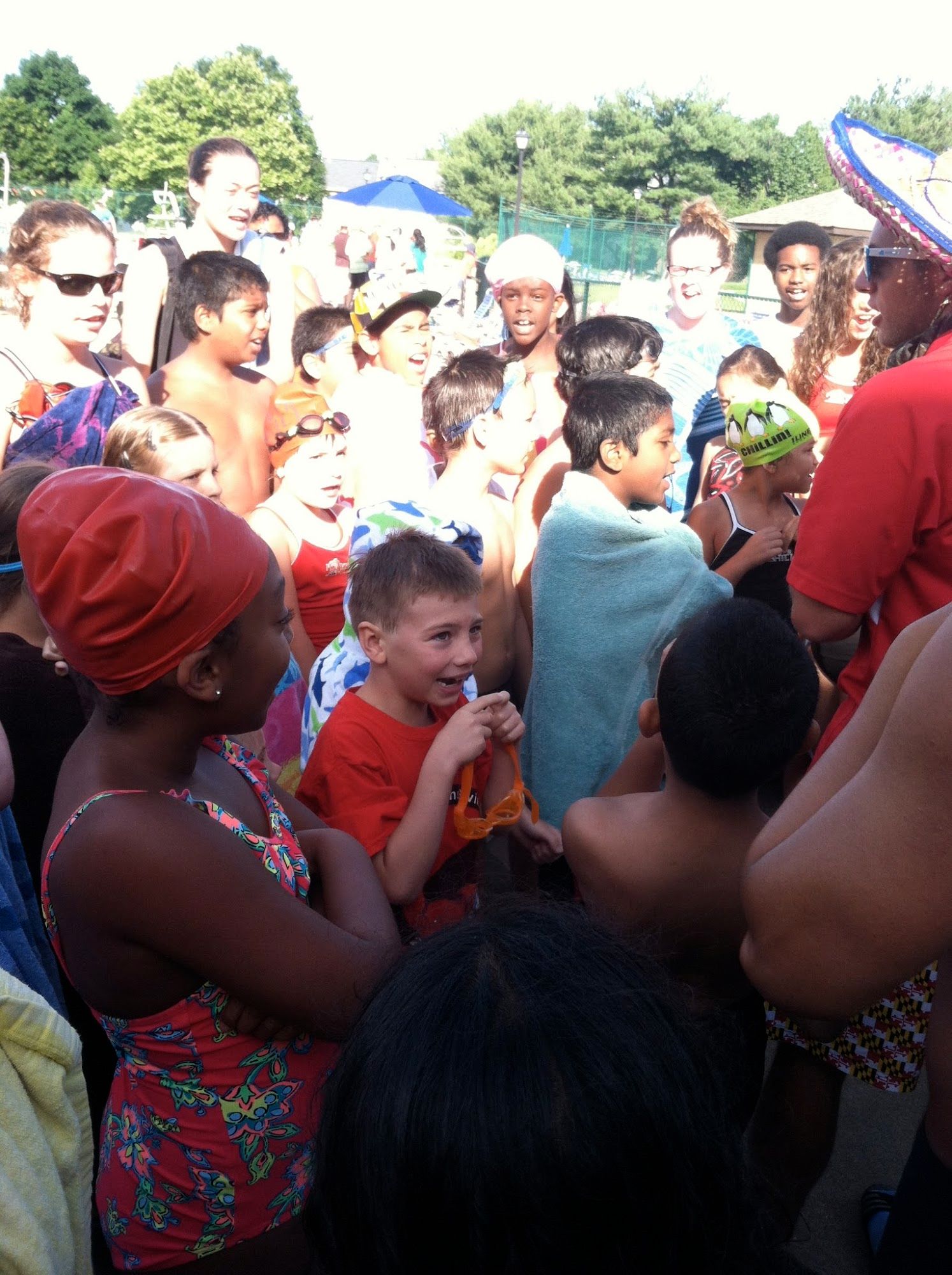 Participating in swim team cheers