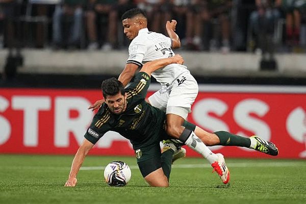 A Straight-Faced Thumbs-Up