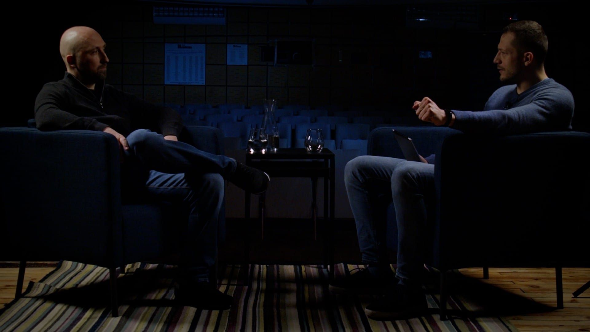 FITE founder Kosta Jordanov talks to Georgi Nenov in a dark theather