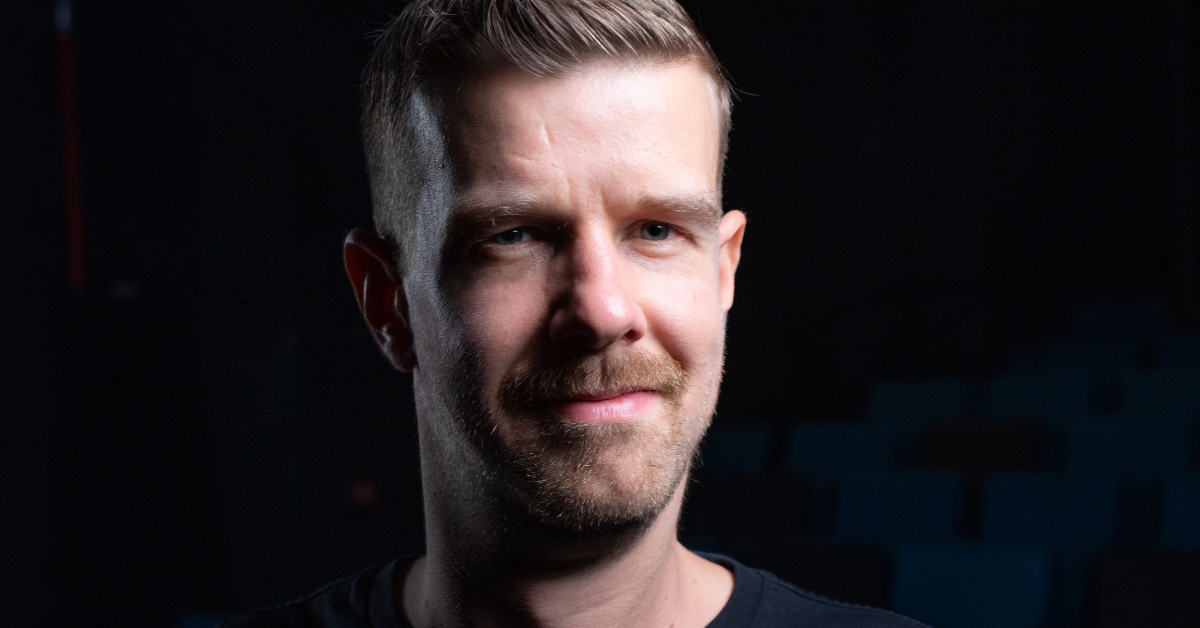 a portrait picture of radu negulescu on a black background