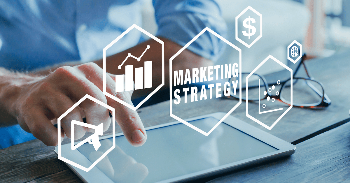 person's hand working on tablet with marketing icons around representing ai marketing tools