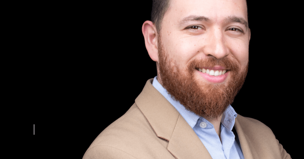 Homsters CEO Dmitriy Aleksandrov on a black background