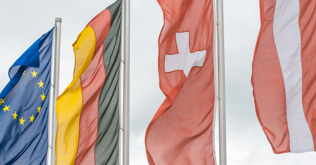 The flags of the European Union, Germany, Switzerland, and Austria