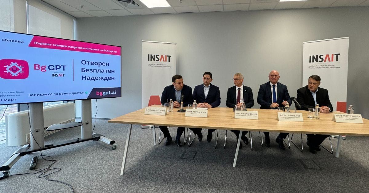 Five men sitting on a table in an even about AI