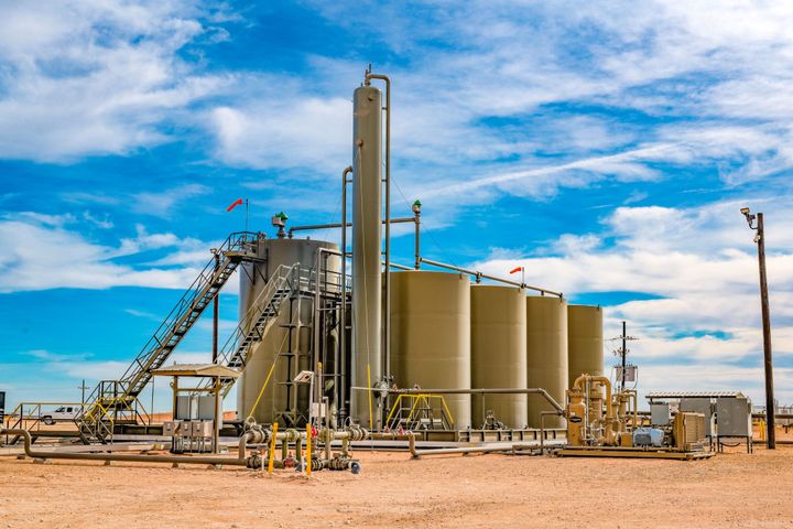 Permian Basin pumpjacks operating at sunset, West Texas oil production