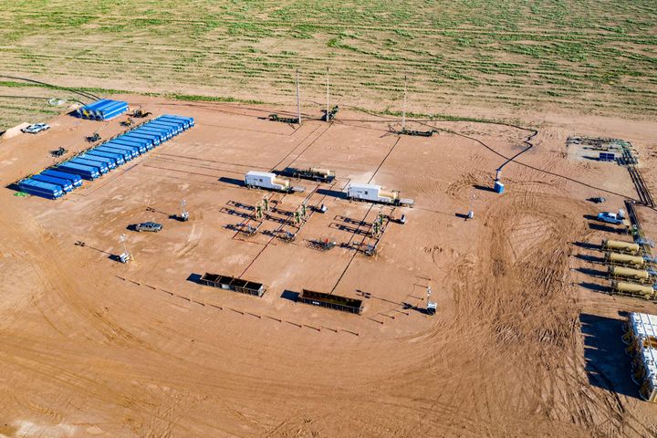 Permian Basin pumpjacks operating at sunset, West Texas oil production