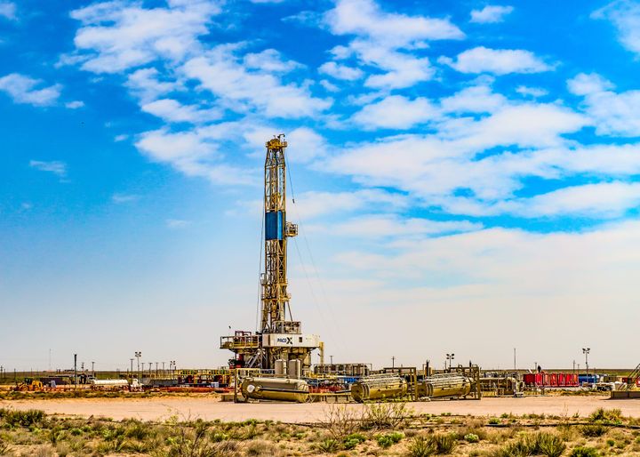 U.S. land drilling rig against open sky, upstream oil and gas operations