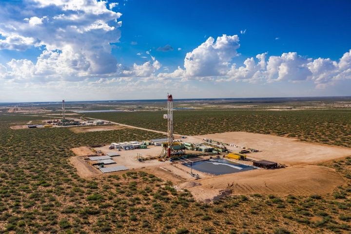 Permian Basin pumpjacks operating at sunset, West Texas oil production