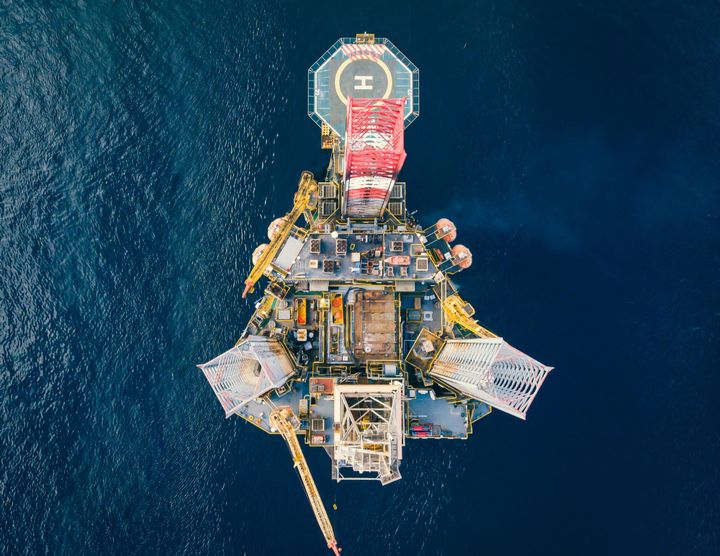Oil and gas production facility representing E&P company quarterly performance