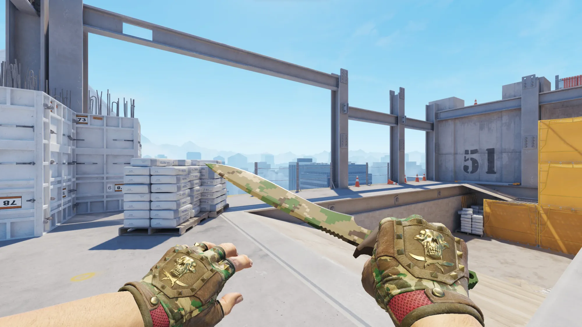 In-game image showing a CS2 knife and glove combo, highlighting the matching colors and patterns of the weapon and gloves.