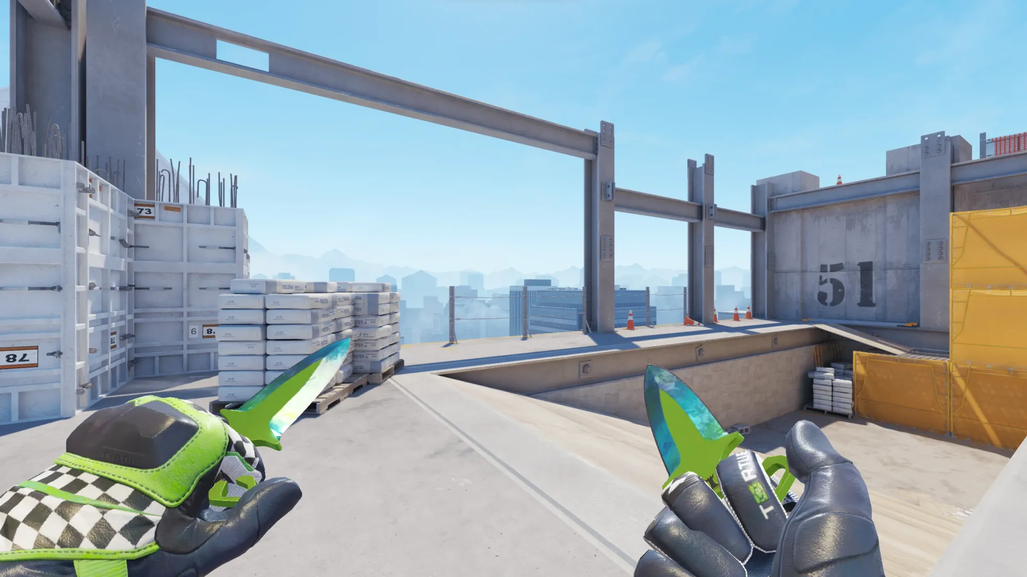 In-game image showing a CS2 knife and glove combo, highlighting the matching colors and patterns of the weapon and gloves.