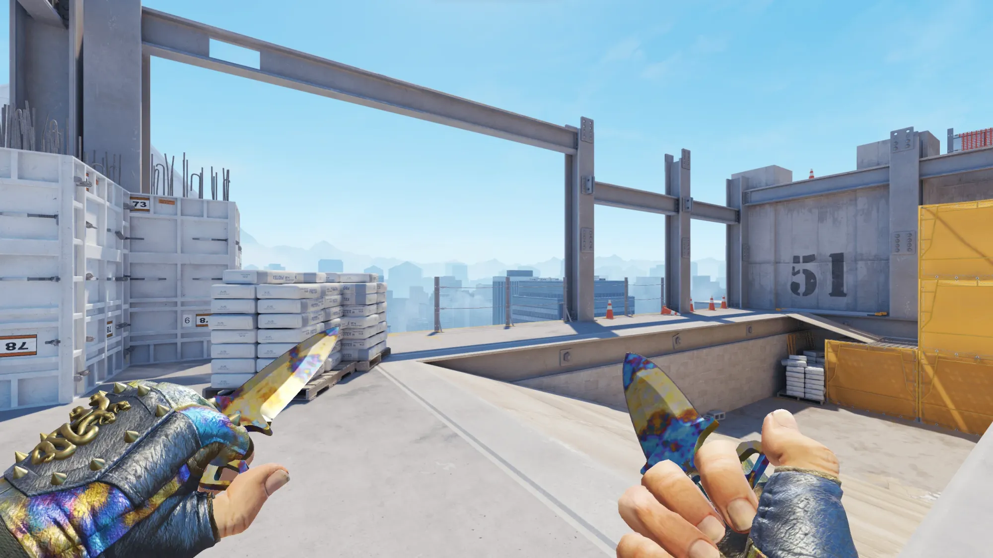 In-game image showing a CS2 knife and glove combo, highlighting the matching colors and patterns of the weapon and gloves.