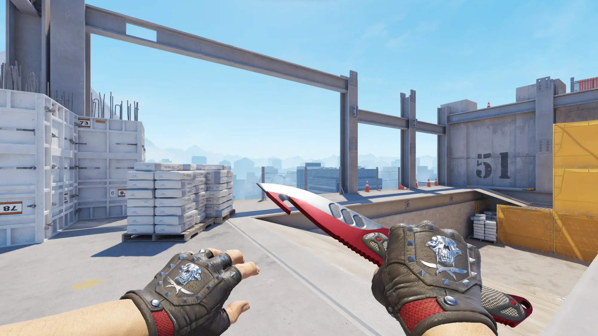In-game image showing a CS2 knife and glove combo, highlighting the matching colors and patterns of the weapon and gloves.