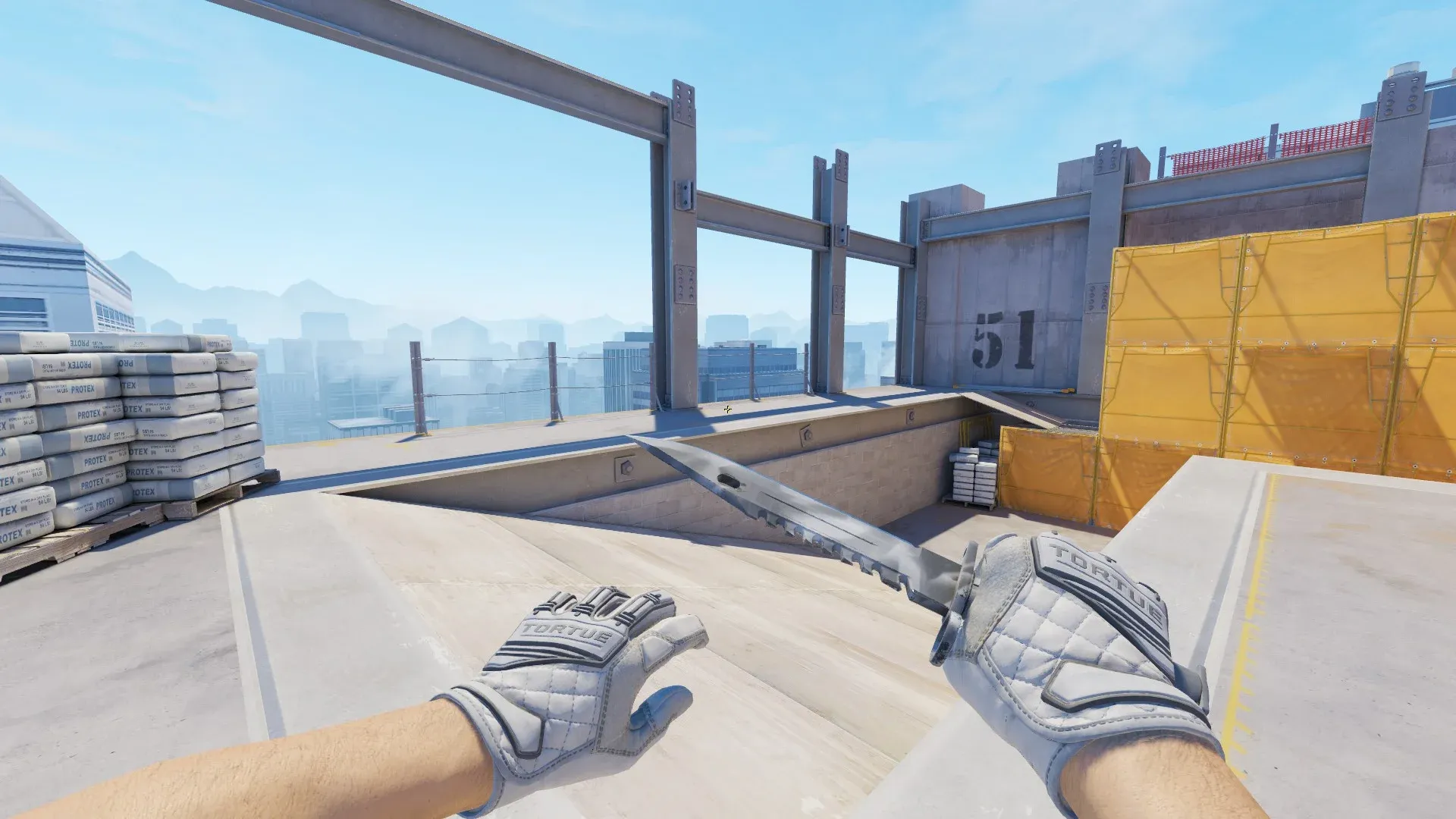 CS2 loadout showcasing the M9 Bayonet Urban Masked with a light grey camouflage blade alongside Specialist Gloves Pillow Punchers featuring a clean white quilted leather design