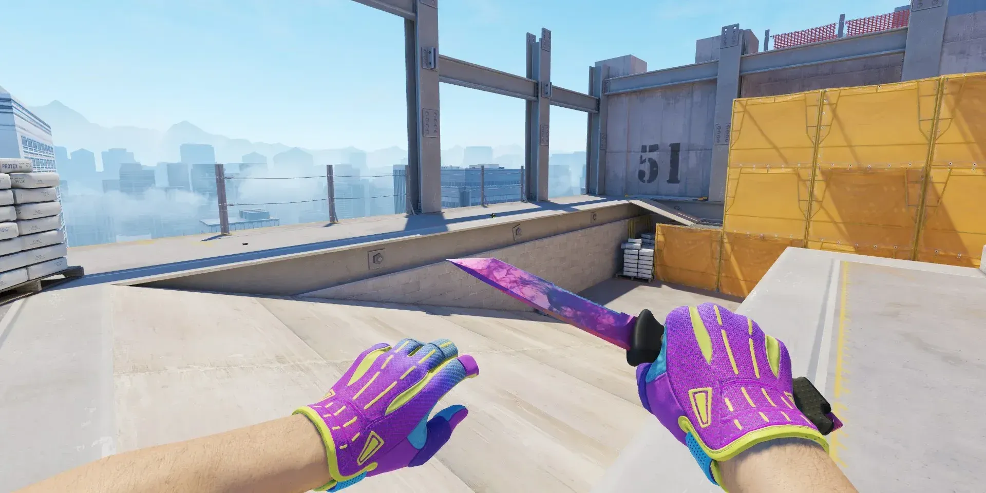 CS2 loadout showcasing the Ursus Knife Doppler Phase 2 with a pink and purple marbled blade alongside Sport Gloves Ultra Violent featuring a bold purple design with neon yellow accents