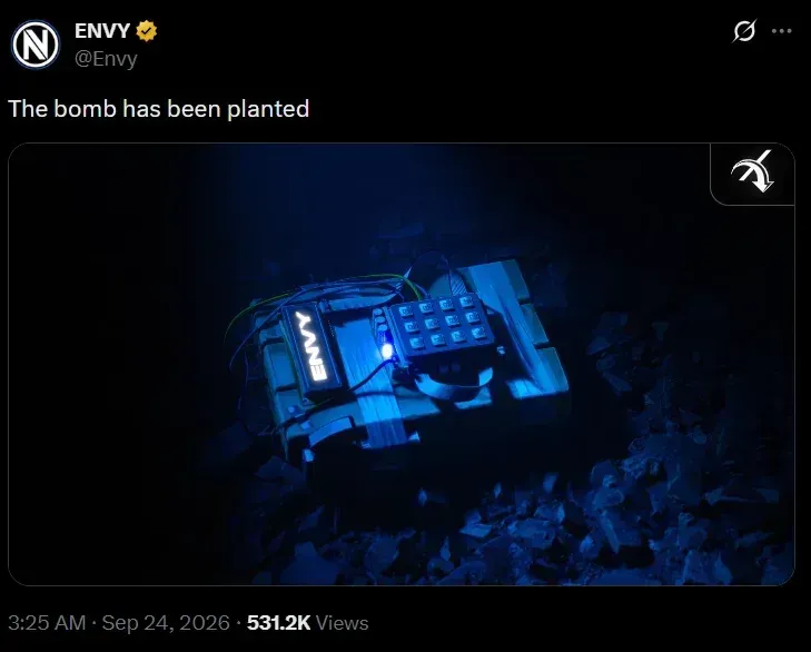 Screenshot of a social media post by Envy reading "The bomb has been planted" above an image of a Counter-Strike C4 bomb glowing blue in the dark with "ENVY" printed on it.   