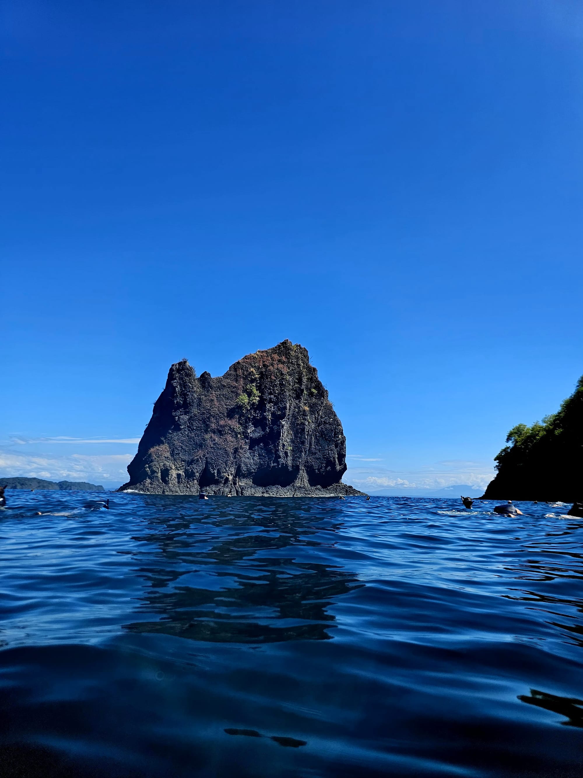 Isla Tortuga — Snorkeling around Isla Tortuga, where clear Pacific water, dramatic rock formations, and calm conditions create one of Costa Rica’s classic island swim and snorkel experiences.