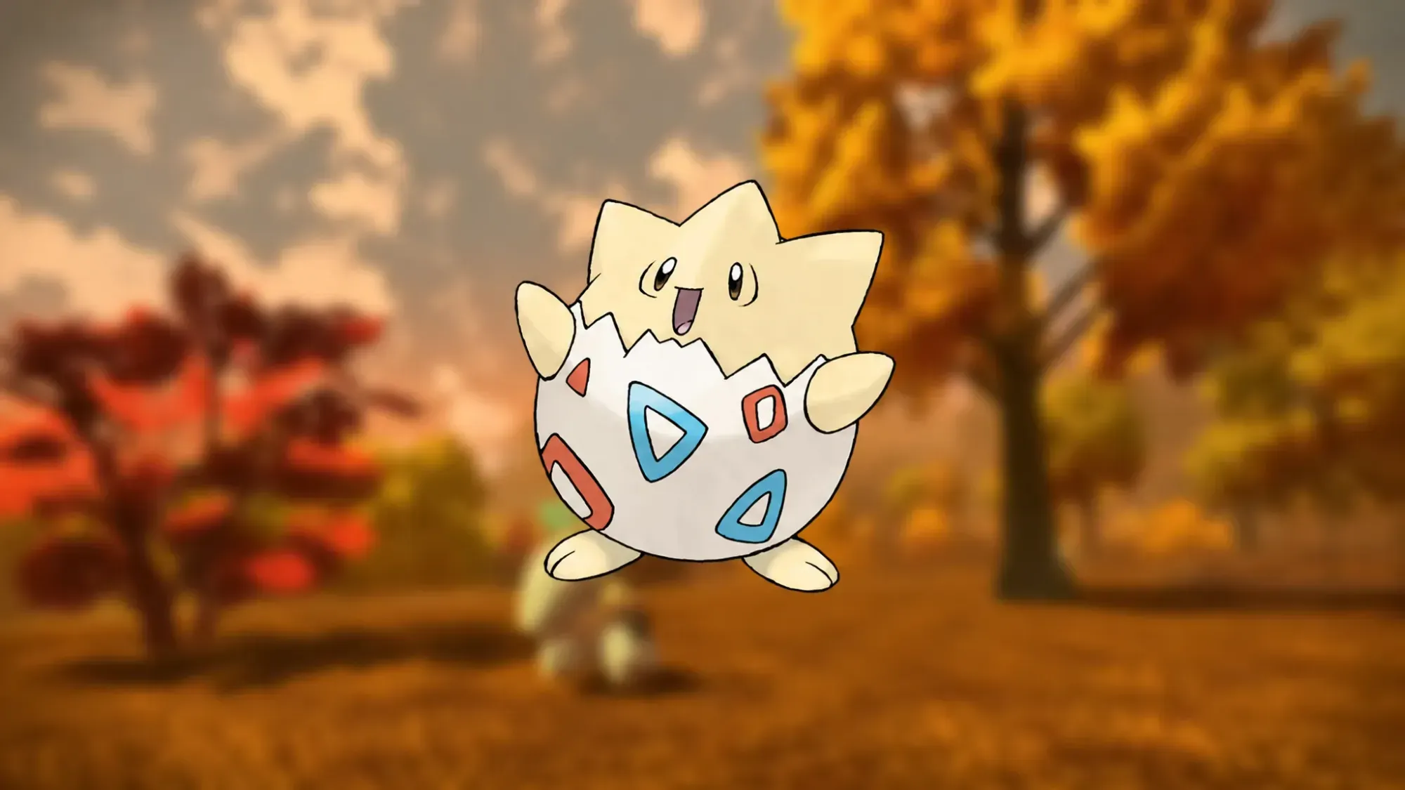 Custom image of a happy Togepi on an autumnal background for cutest Pokemon guide