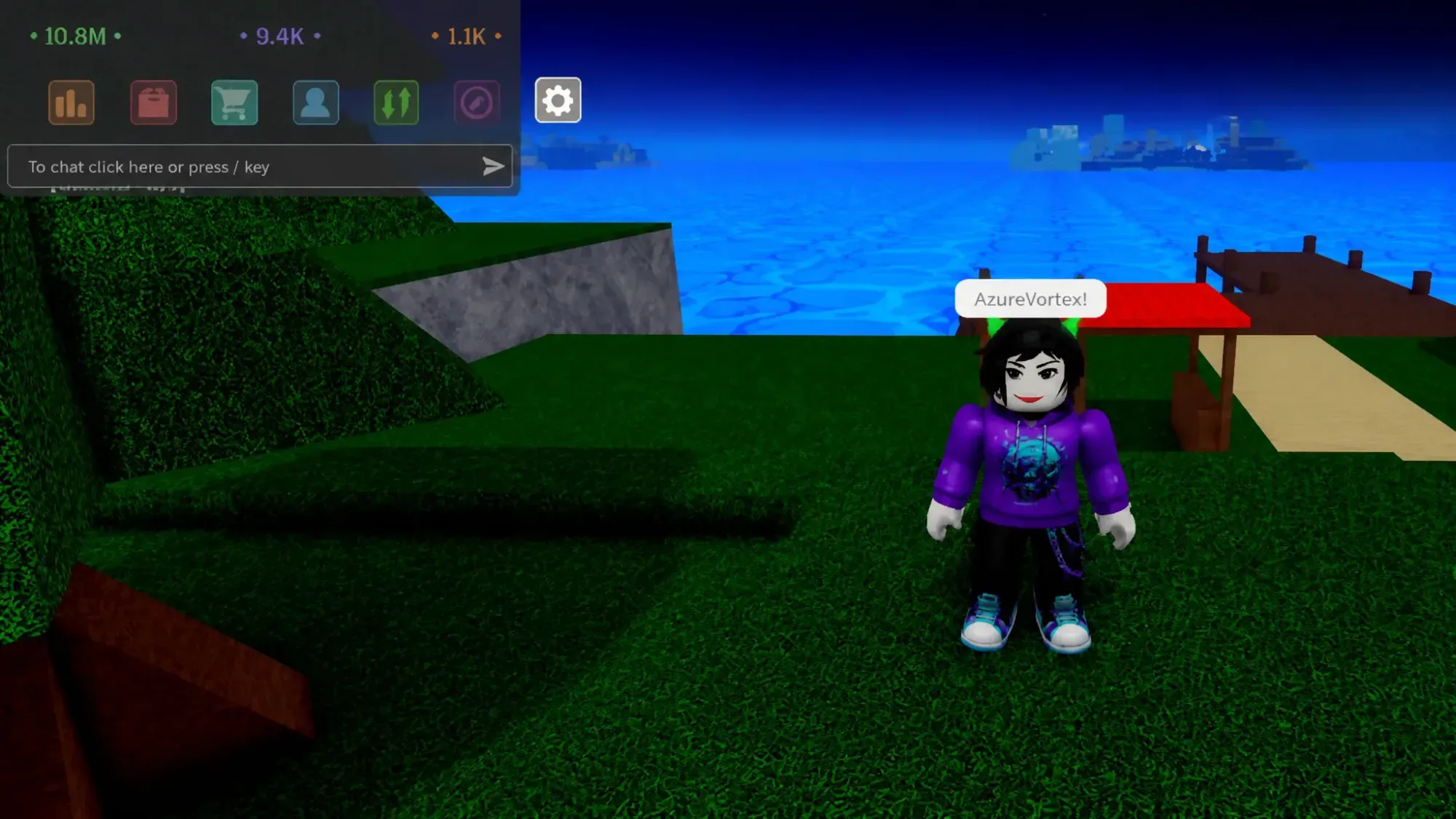 Verse Piece codes: A chat text box in the top left corner, the Pt logo in thr right, and an avatar stood on grass with a pier and sea in the background