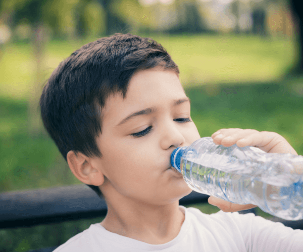 Boy drinking water
