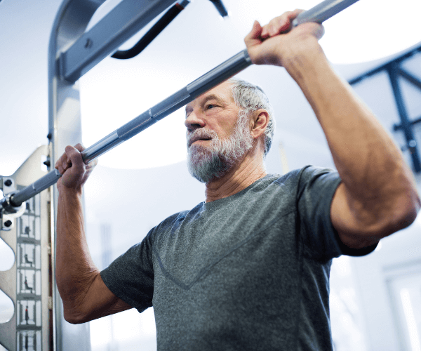 Man lifting on weight machine