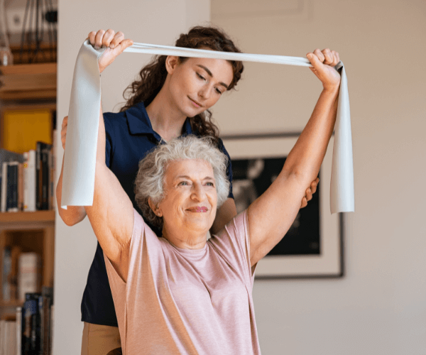 Senior patient doing elastic band exercise