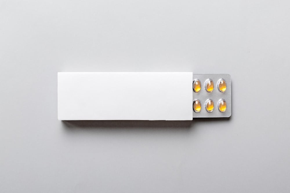 Blank white product package box mockup open blank medicine drug box with omega blister top view
